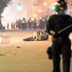 Couple Kisses During Vancouver Riot