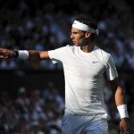 Spanish player Rafael Nadal reacts as he