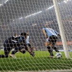 Argentine goalkeeper Juan Carrizo tries