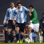 Argentine forward Lionel Messi (C) is ma