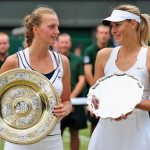 Czech player Petra Kvitova (L) holds the