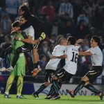 Uruguayan footballers celebrate at the e